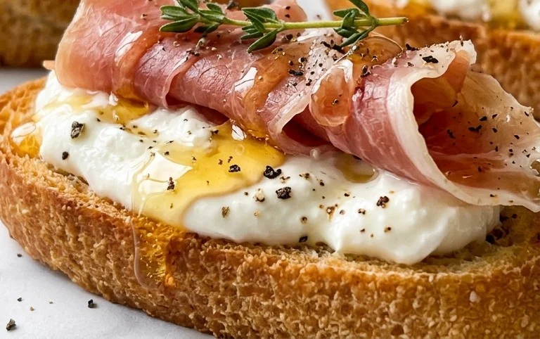 Beef Prosciutto Crostini with Burrata and Lemon Honey Drizzle